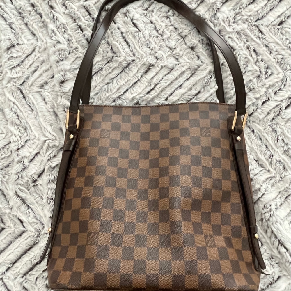 Brown purse with LV accents